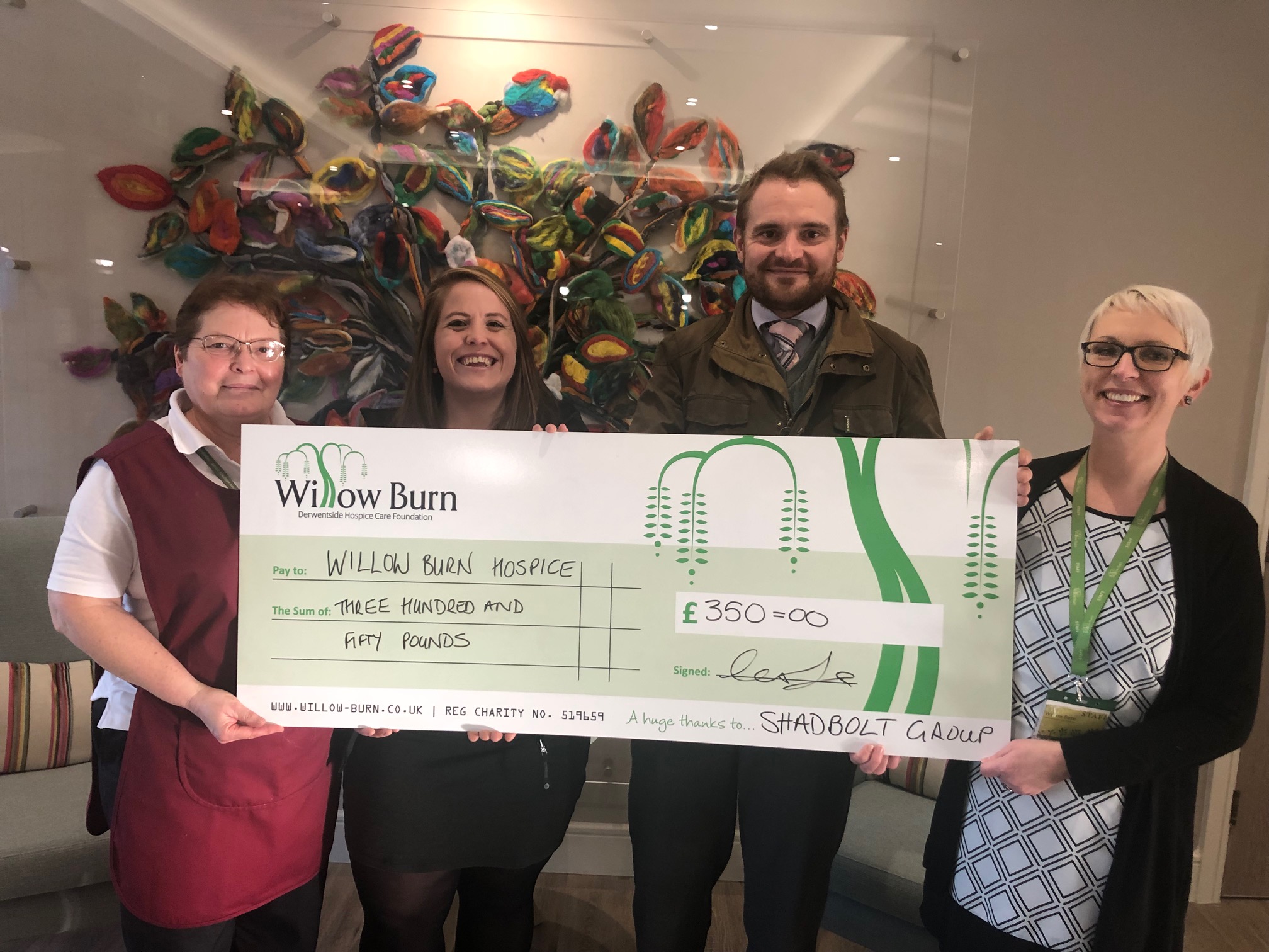 Shadbolt make donation to non-profit organisation